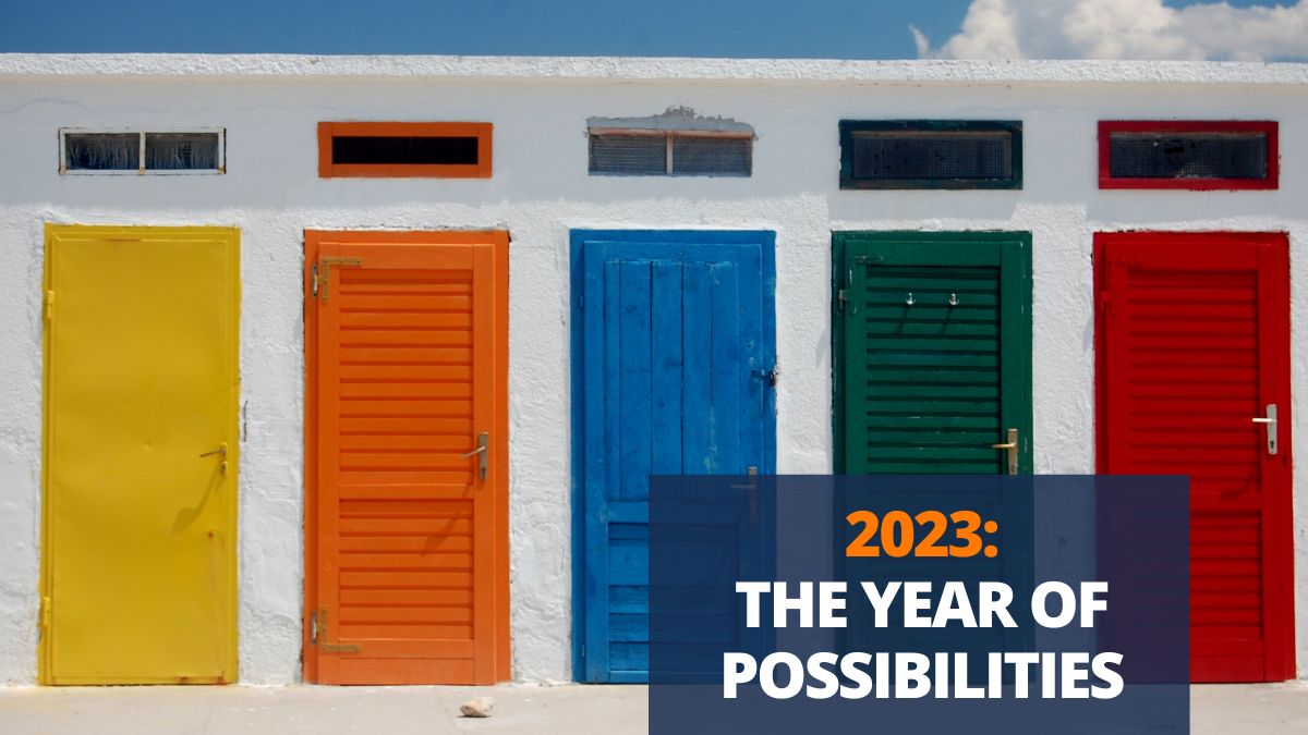 five closed doors in different colors waiting to be opened to represent the possibilities in the new year